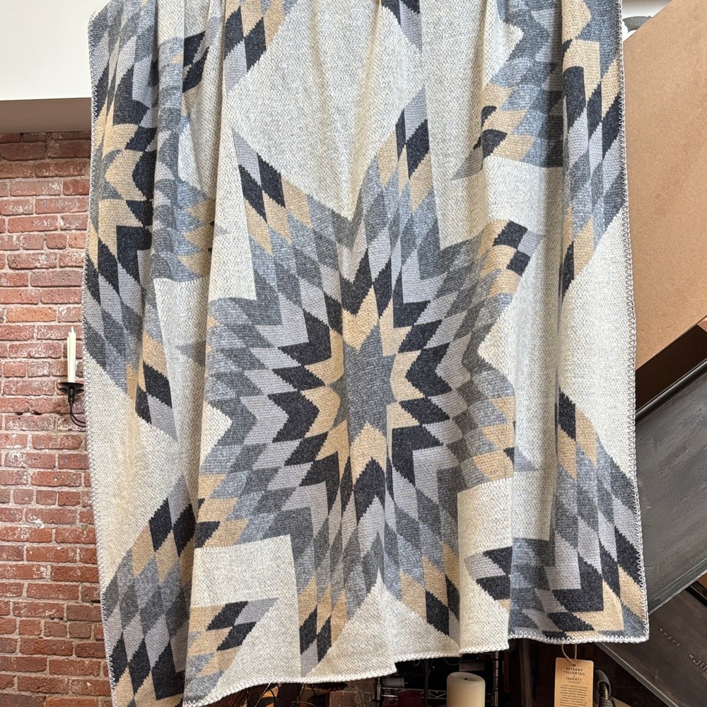 Faherty brand wool blend throw.